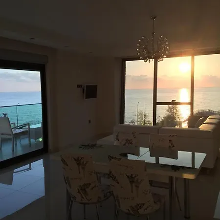 아파트 Luxury Apt In Konak Seaside Homes With A Sea Front View And A Private Beach