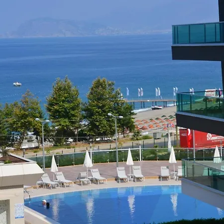 아파트 Luxury Apt In Konak Seaside Homes With A Sea Front View And A Private Beach